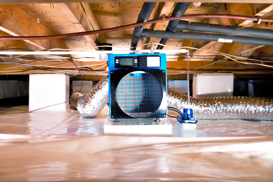 dehumidifier running in sealed crawlspace with vapor barrier installed