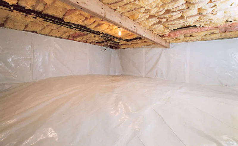 encapsulated crawlspace with sealed cracks and white vapor barrier